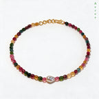 Tourmaline mix necklace, one pearl moment — that girl era
