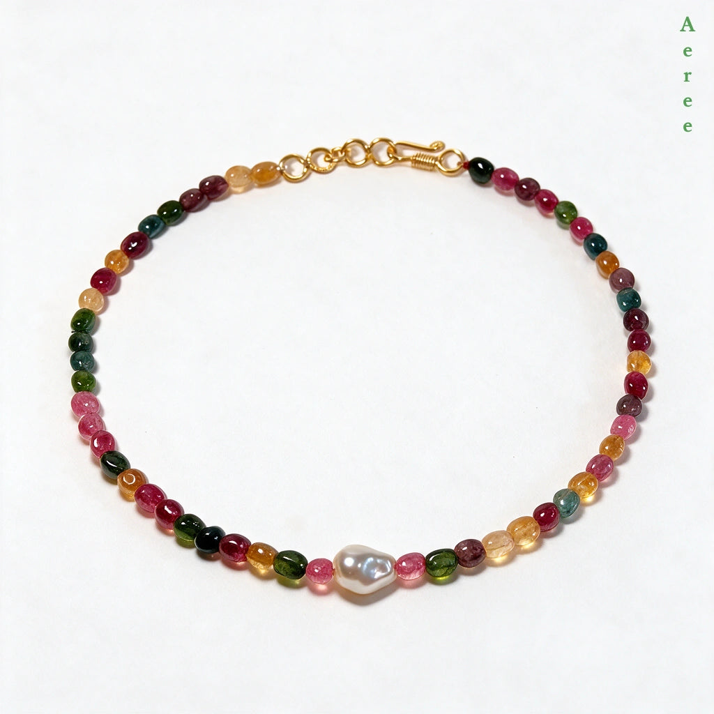 Tourmaline mix necklace, one pearl moment — that girl era