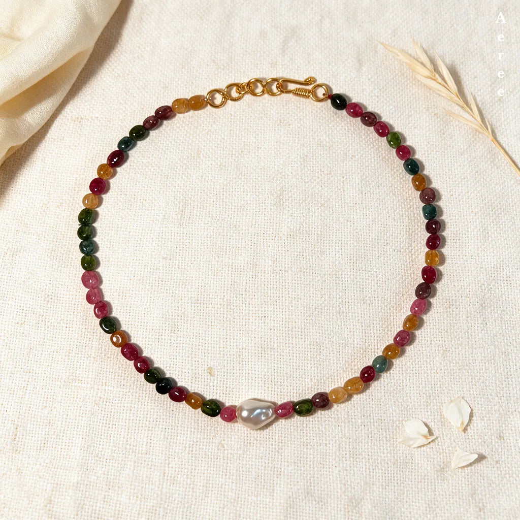 Tourmaline mix necklace, one pearl moment — that girl era